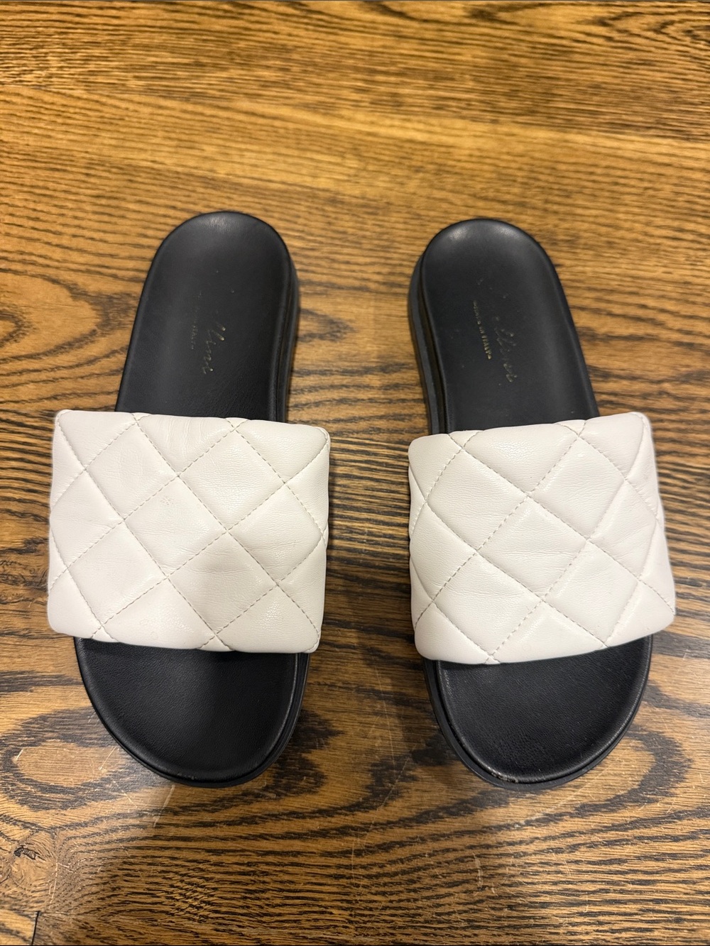 White Quilted Slide Sandals with Black Leather  Footbed
